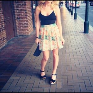 Black cross back top with colorful skirt